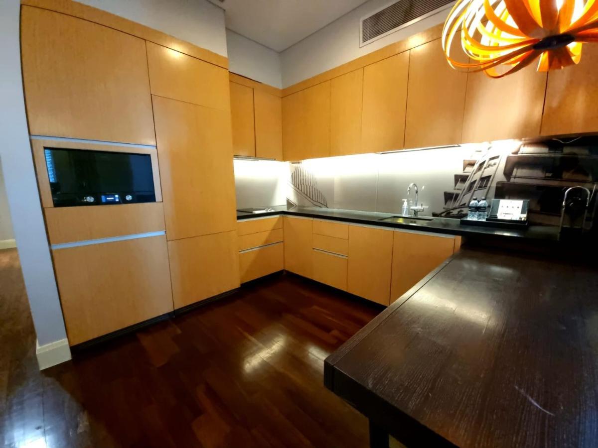 Ascott Raffles Place Singapur Exterior foto A kitchen in a private home