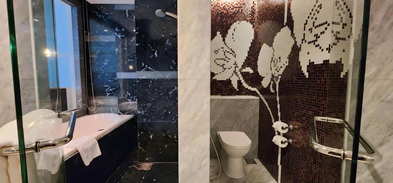 Ascott Raffles Place Singapur Exterior foto Bathroom