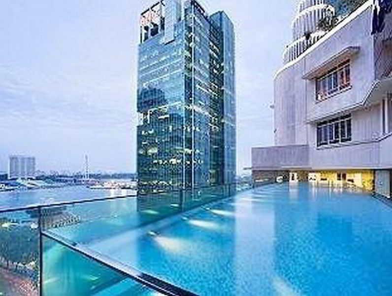 Ascott Raffles Place Singapur Exterior foto The pool at the hotel